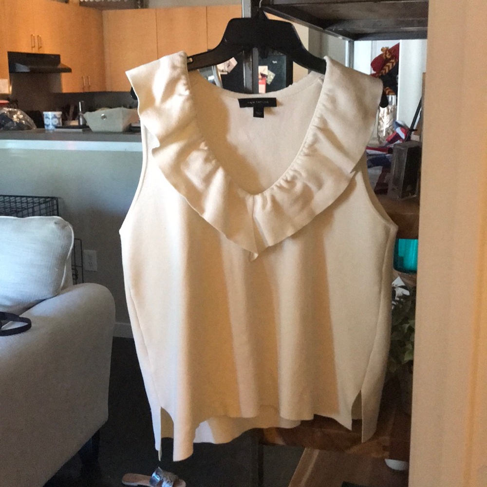 A cream colored top for all occasions